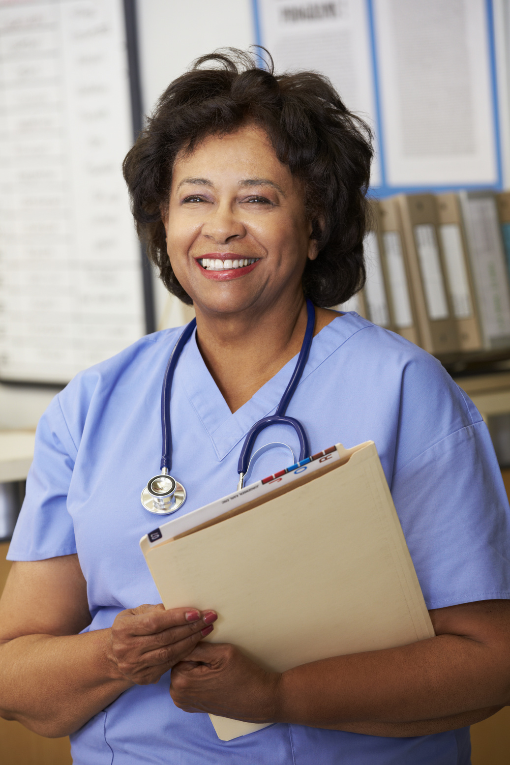 Female Nurse at Nurses Station